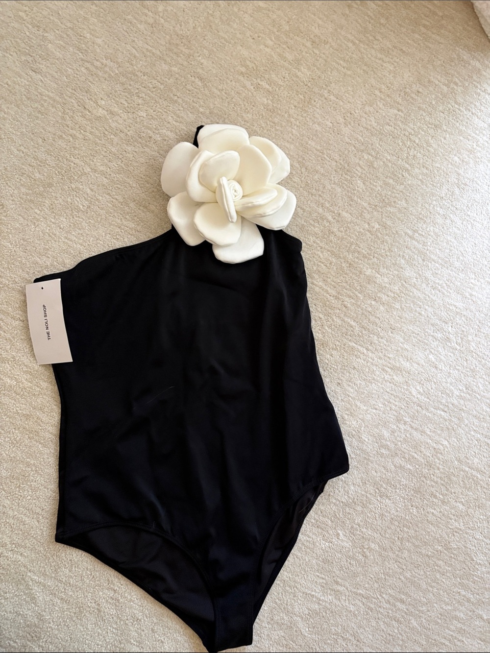 Noli One-Shoulder Black Swimsuit with White Floral Applique